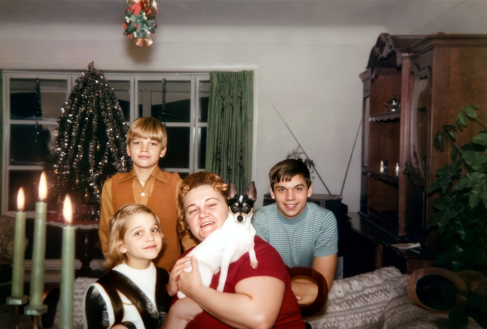 The restored Christmas family photograph with clearer faces and balanced color